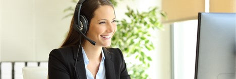 Image of Woman with Headset Smiling