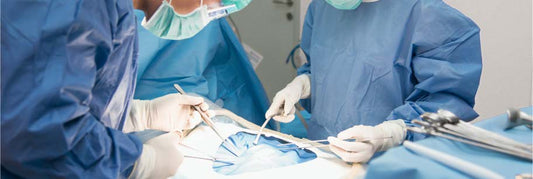 Image of Surgeons in the OR, Showing Drapes and Gowns
